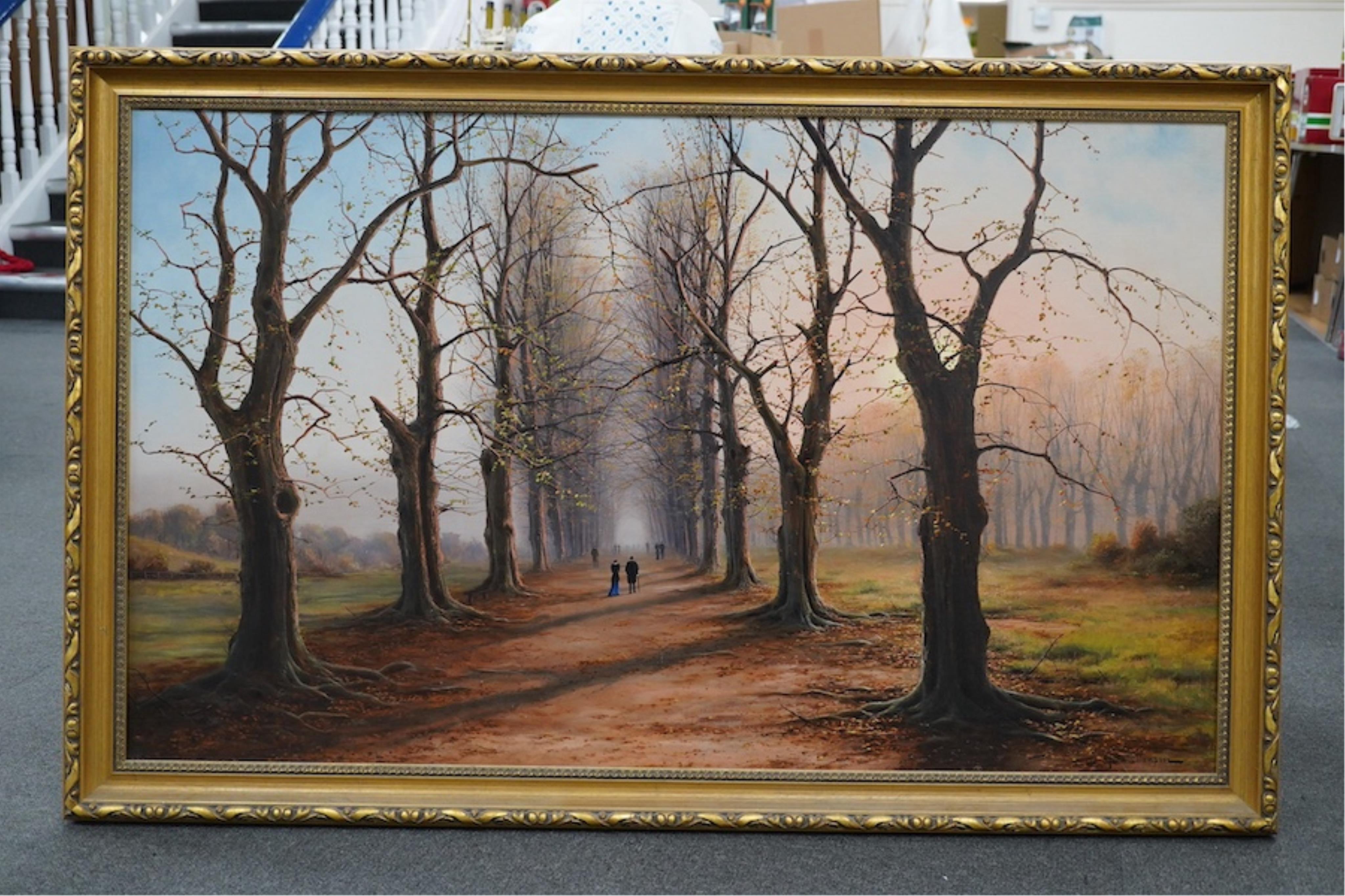 Niels H. Christiansen (1850- 1922), large oil on canvas, Tree lined pathway with figures, signed, 75 x 125cm, gilt framed. Condition - good